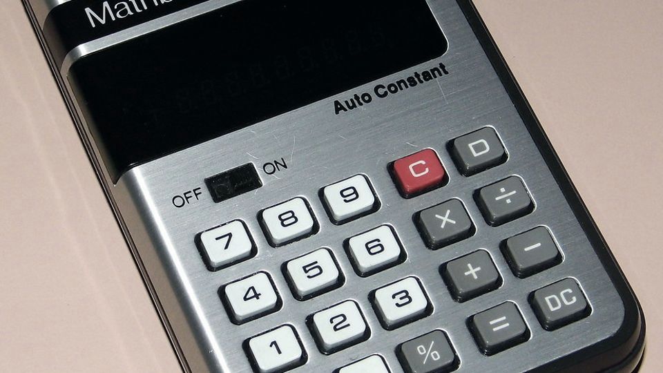 A vintage silver pocket calculator