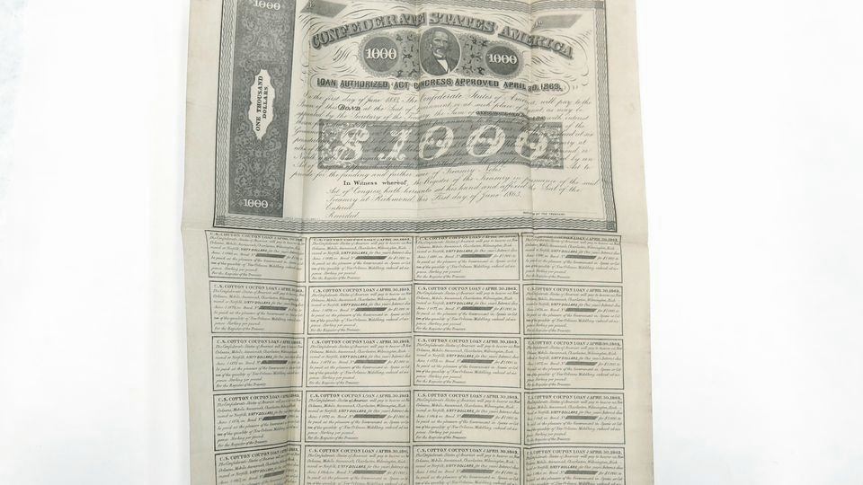 A historical bond certificate with rows of detachable interest coupons